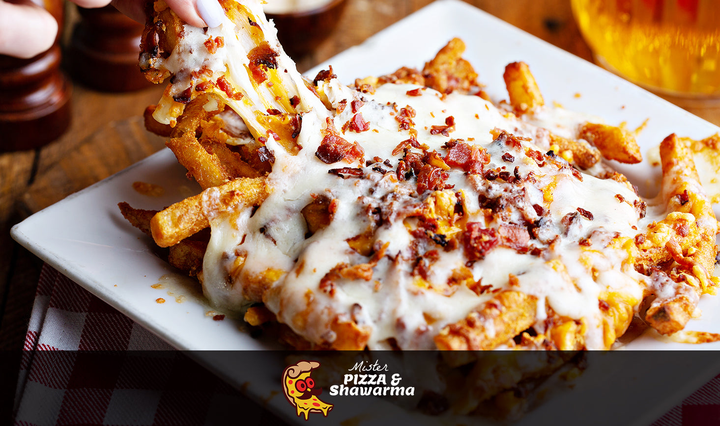 Loaded Fries (Topped with Beef Bacon, Cheese Wiz & Mozarella)